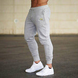 Male Trousers Casual Pants Sweatpants Men Gym Muscle Cotton Fitness Workout hip hop Elastic Pants