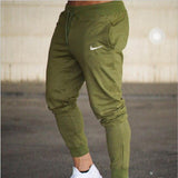 Male Trousers Casual Pants Sweatpants Men Gym Muscle Cotton Fitness Workout hip hop Elastic Pants